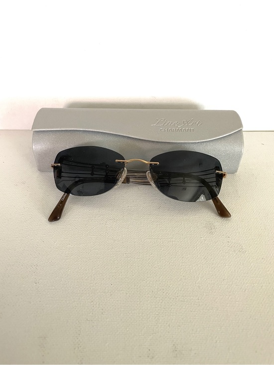 Line Art Accessories - Line Art Charmant Women’s Rimless Black Sunglasses